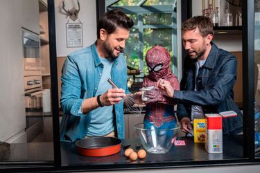 Christophe Beaugrand pose chez lui en compagnie de son mari Ghislain, leur fils Valentin et leur chiuenne Madame. Sevres, FRANCE-03/04/2024