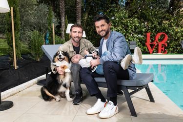 Christophe Beaugrand pose chez lui en compagnie de son mari Ghislain, leur fils Valentin et leur chiuenne Madame. Sevres, FRANCE-03/04/2024